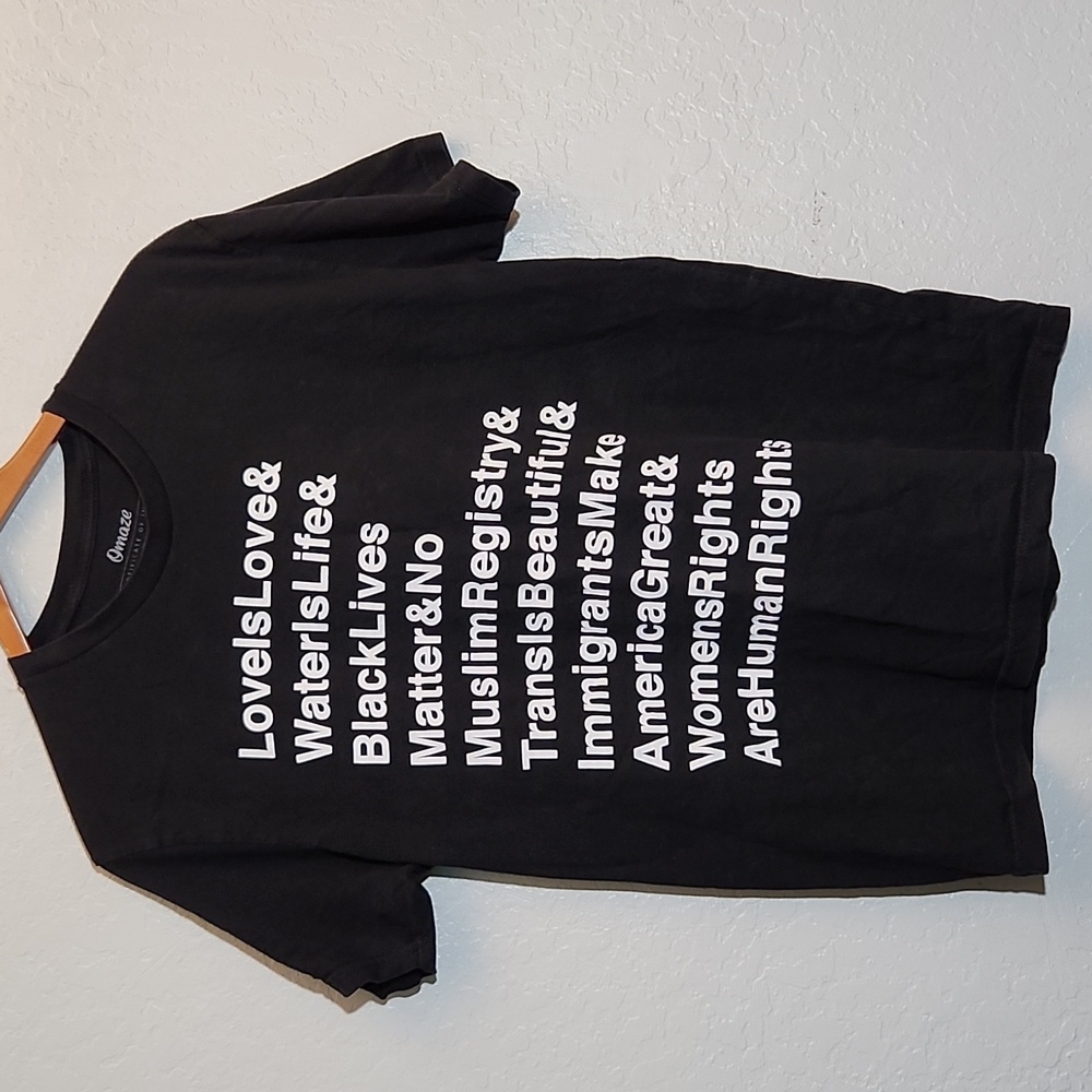 OMAZE Here To Stay Activist Graphic  Black T Shirt Medium Unisex